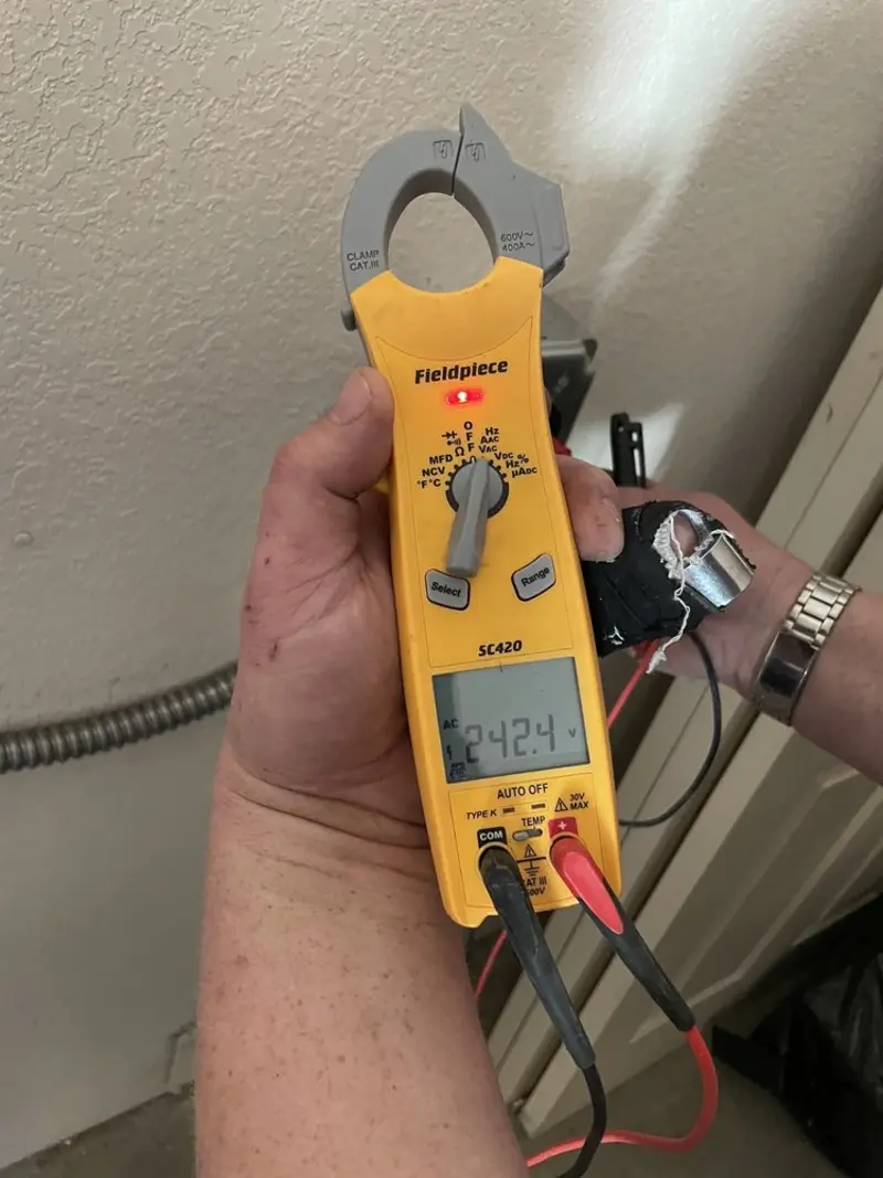 Voltage testing with clamp meter during Generator Installation in Planada